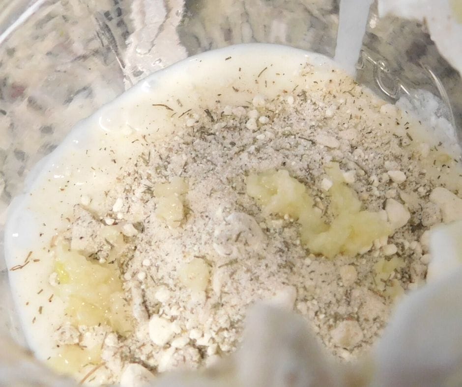 ingredients for ranch dressing going into a jar