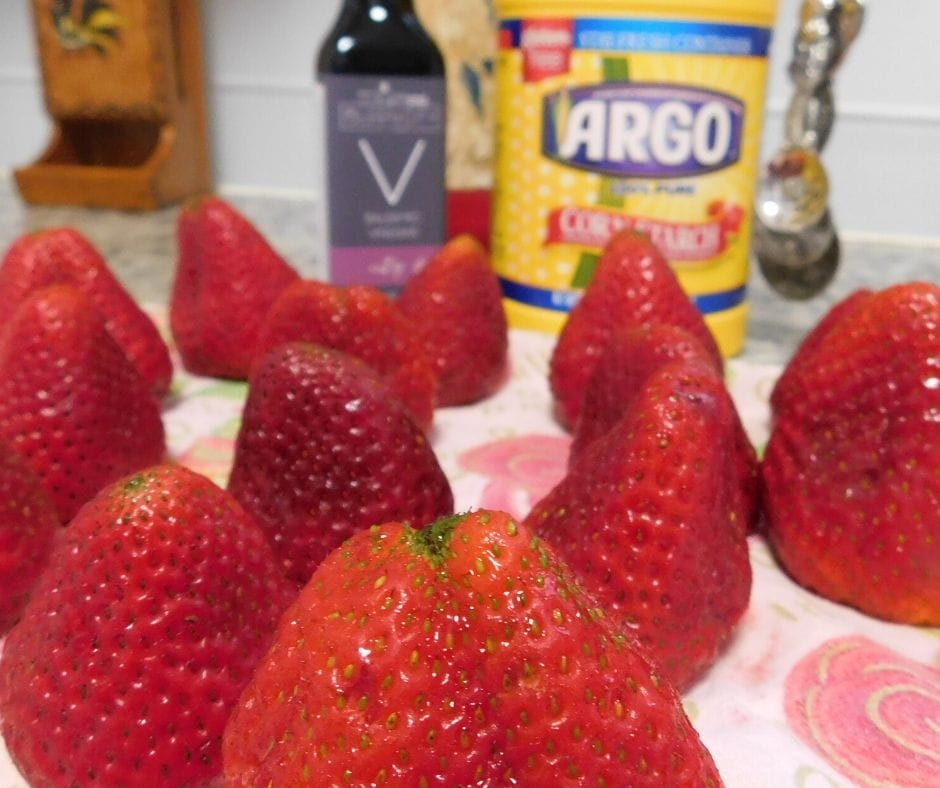 strawberries drying on a towel with fig balsamic vinegar and corn starch