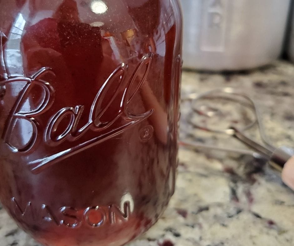 jar of homemada vanilla syrup on the counter