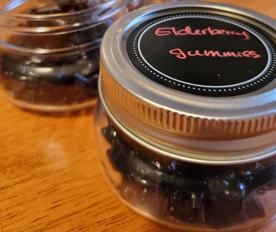organic elderberry gummies in a small mason jar on the table