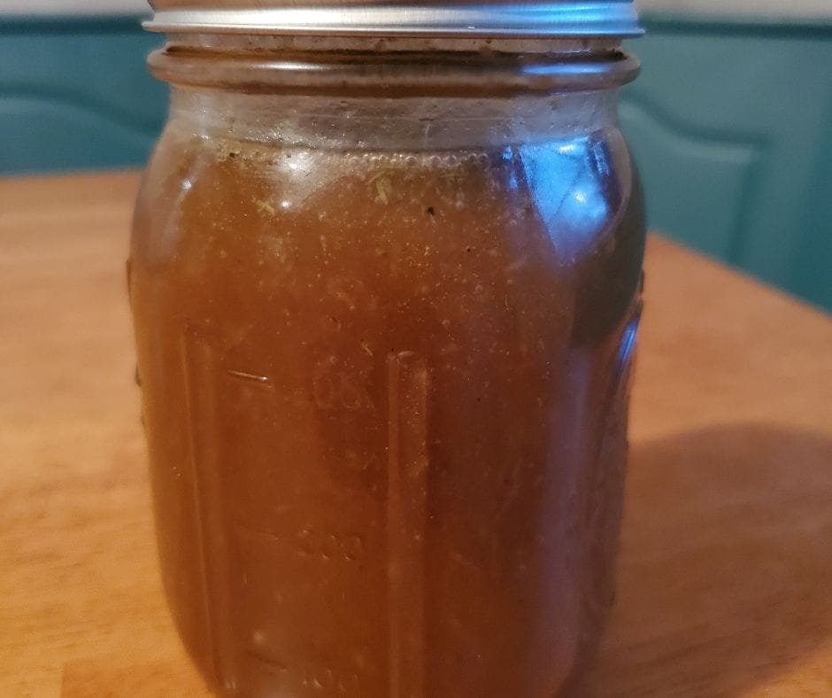 citrus balsamic dressing in a mason jar on the table
