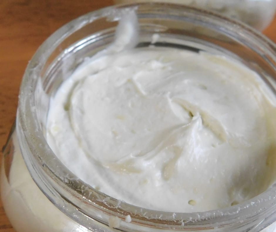 whipped body butter in a jar on the table