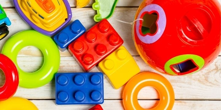 miscellaneous toys scattered on a board