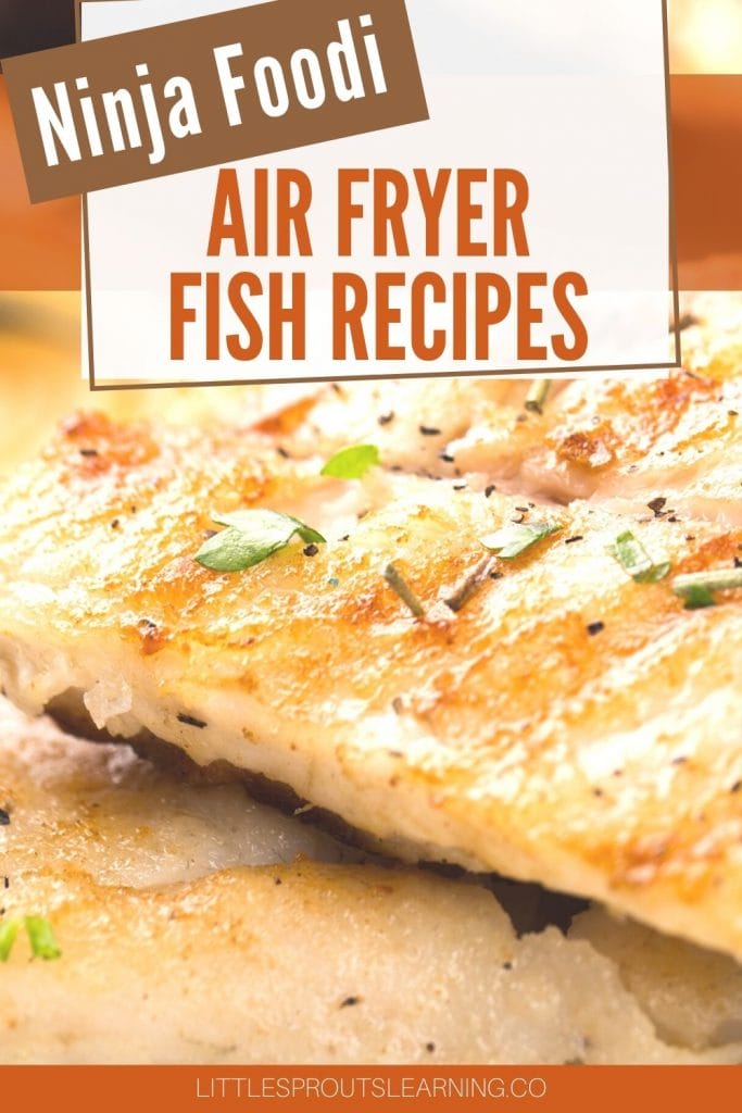 air fryer fish fillets browned and topped with herbs stacked on a plate