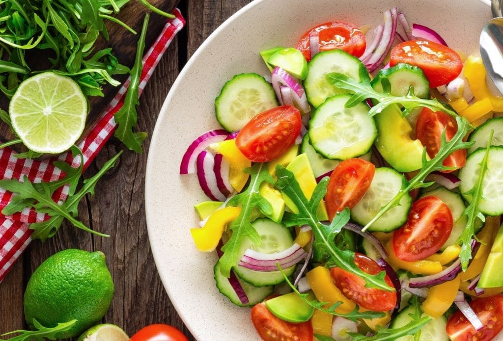 Cucumber salad with tomatoes and arugula