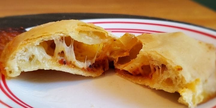 meatless hot pockets cut in half on a plate