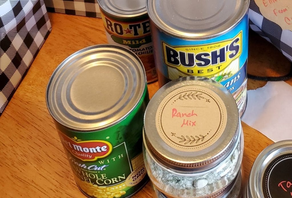 Ingredients for taco soup gathered in the table