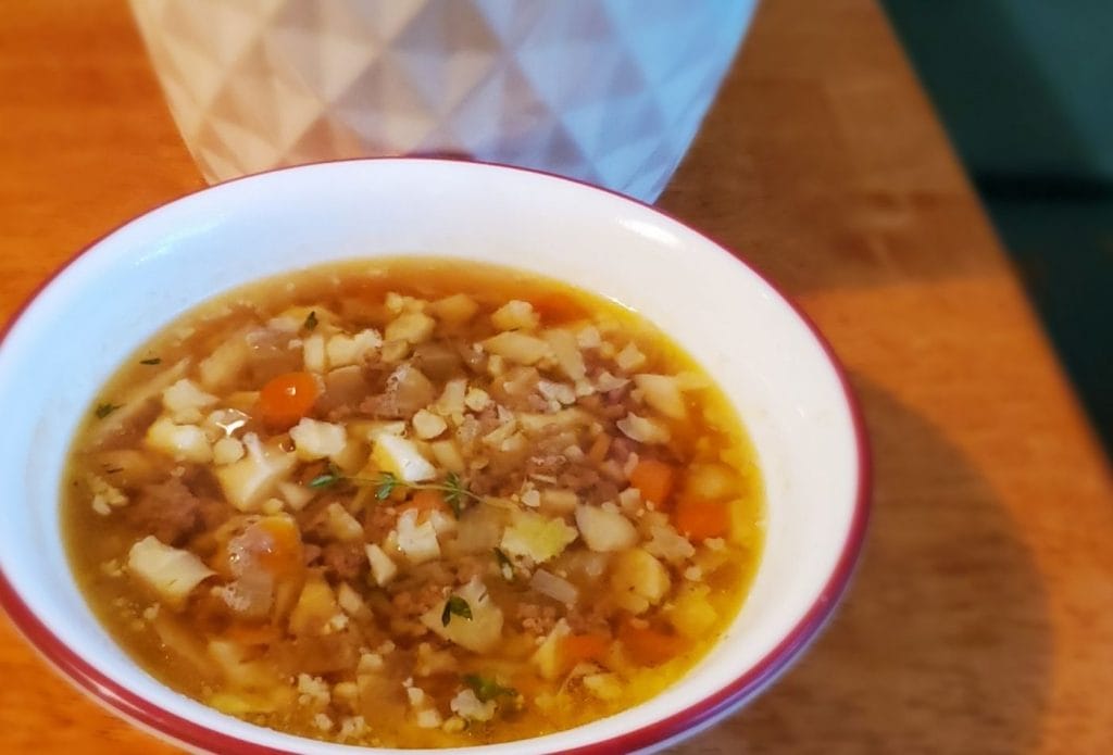 Hamburger cauliflower soup in a bowl on the table
