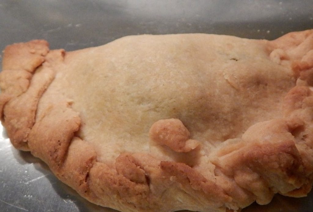 empanada on a sheet tray