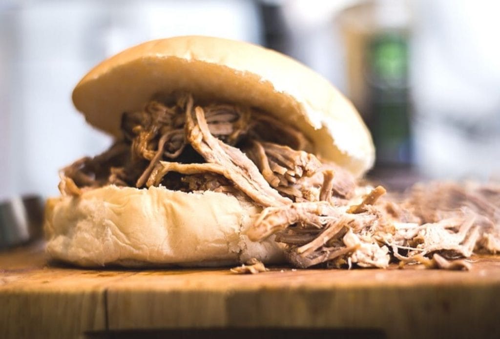 make-ahead freezer meal bbq sandwich on a cutting board