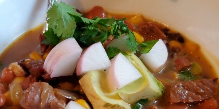 mexican leftover smoked brisket soup in a bowl.