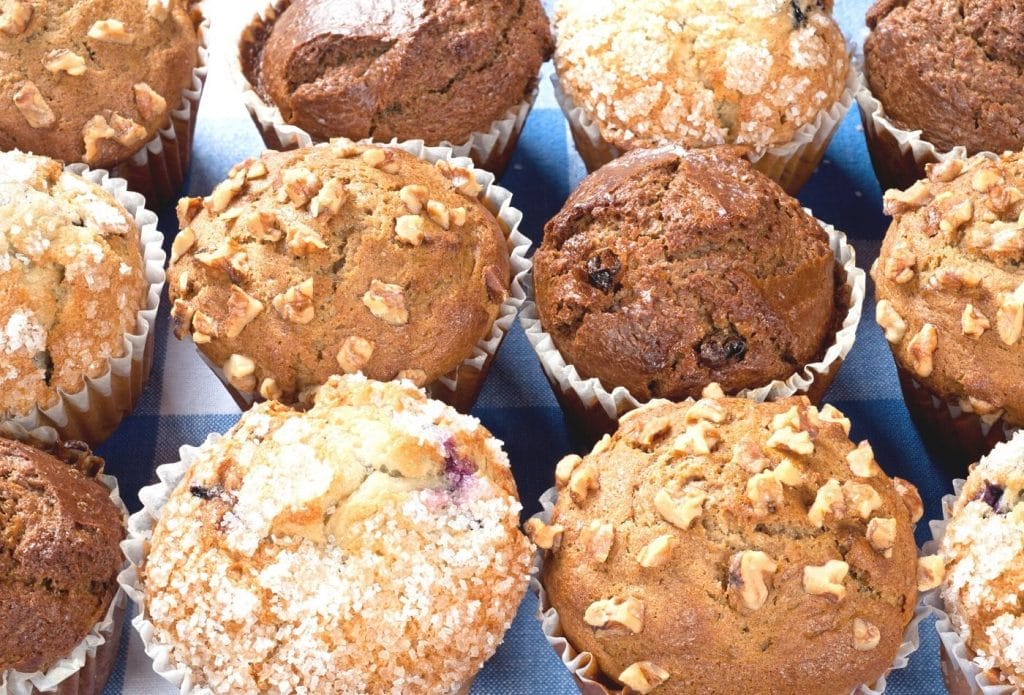 different kinds of oatmeal lined up on a tray