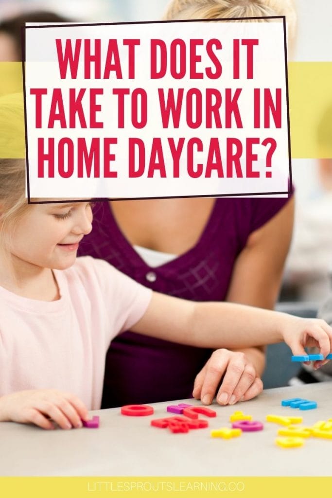 home daycare provider sitting with a while working together on an activity. 