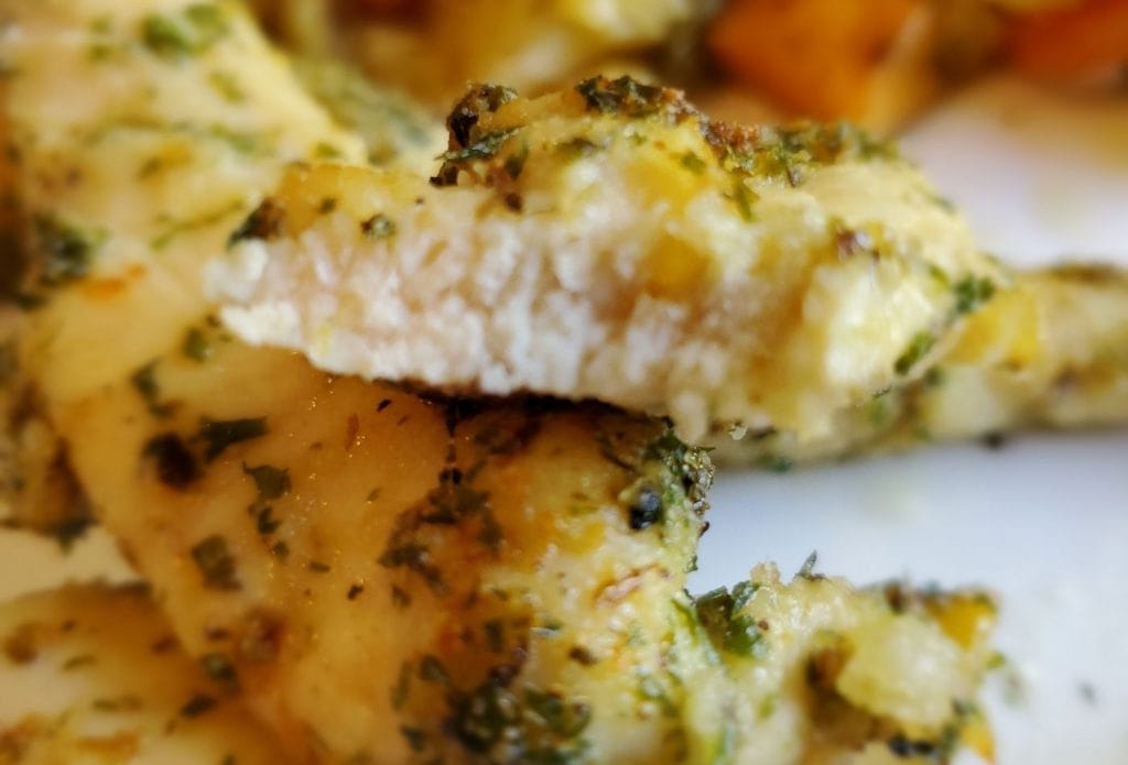 tender juicy chicken strips with herbs on the outside