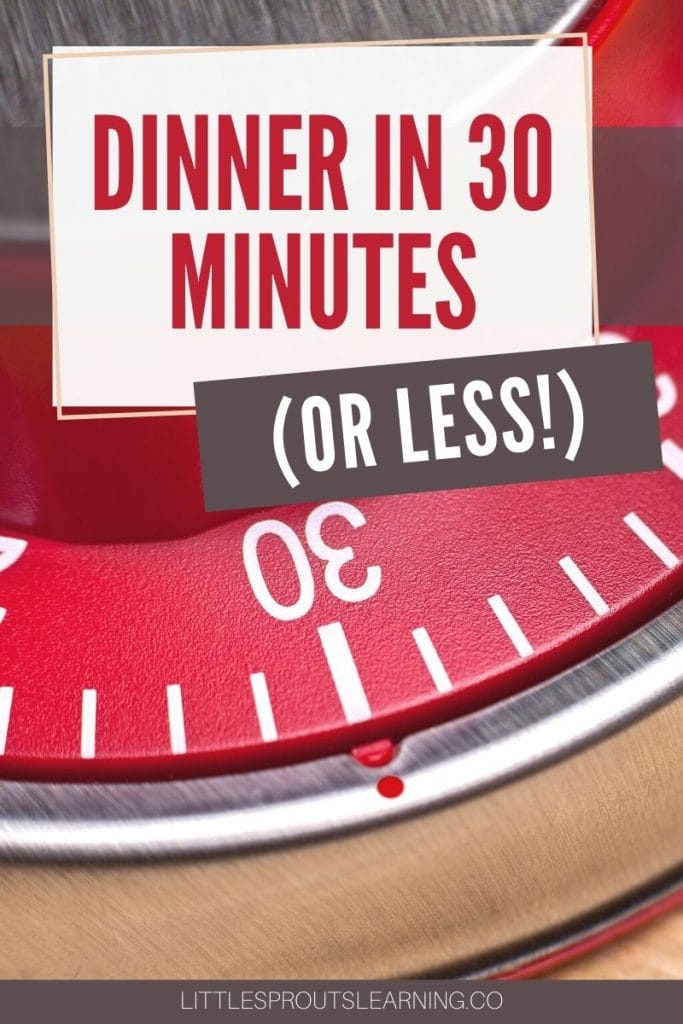 Red kitchen timer set to 30 minutes for dinner