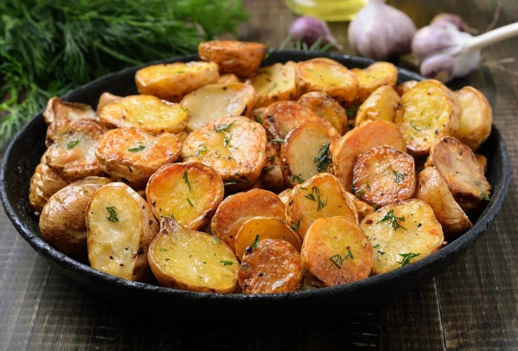 crispy brown roasted potatoes in a bowl