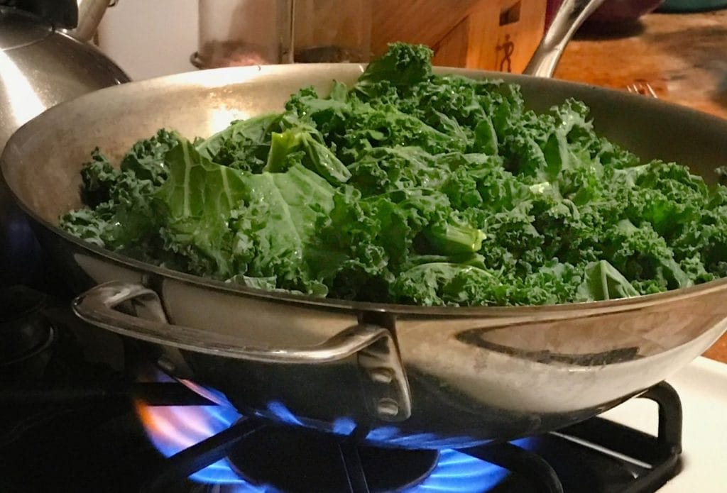 kale chopped up in a skillet