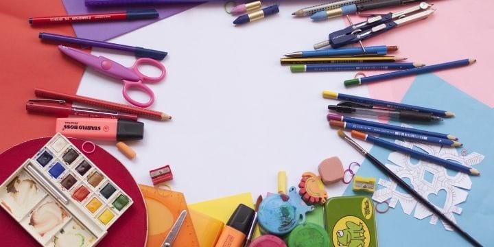 art supplies arranged on a pad of paper