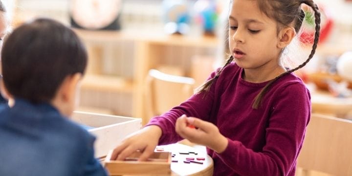 kids playing with puzzles and drawing at childcare