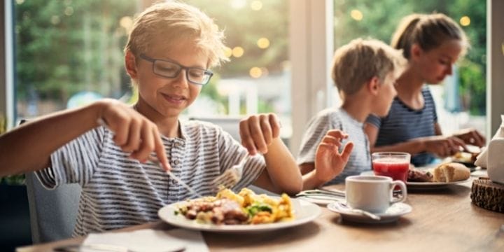 kids eating dinner at the table