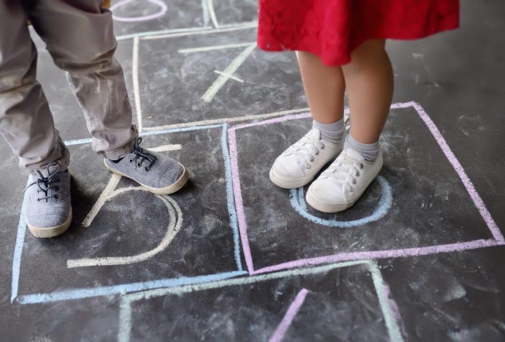 kids playing hop scotch at daycare