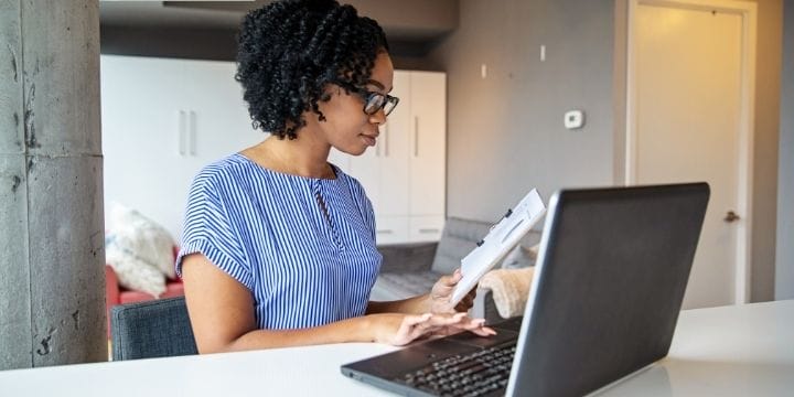 woman working on her side job on the computer