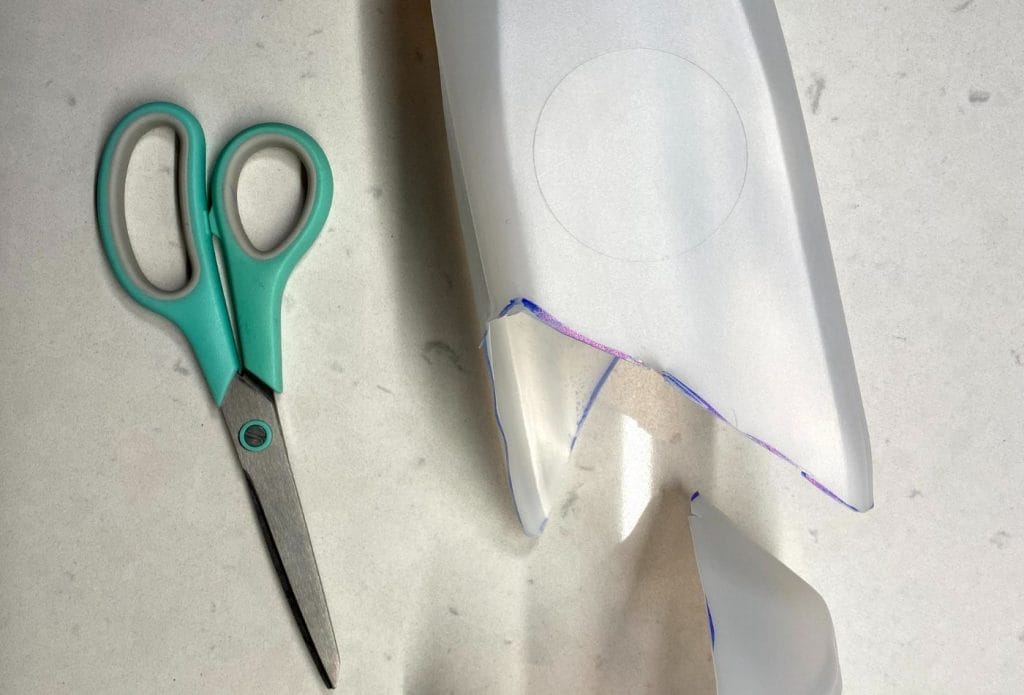 cut milk carton to start shark catcher craft