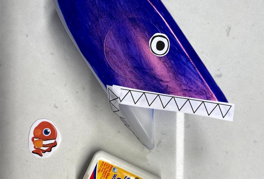 bruce milk carton catcher, nemo fish and bottle of glue