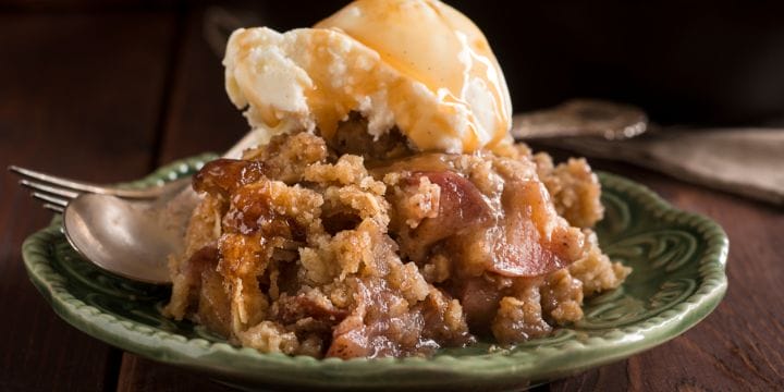 apple crisp topped with ice cream