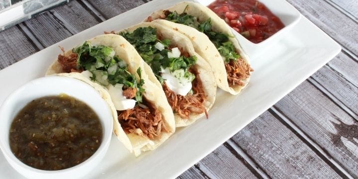 leftover pork tacos on a plate with salsa