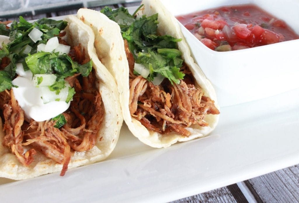 leftover pulled pork tacos on a plate