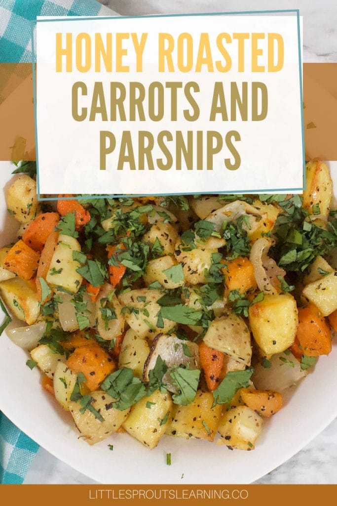 honey roasted potatoes, carrots, and parsnips in a bowl garnished with parsley