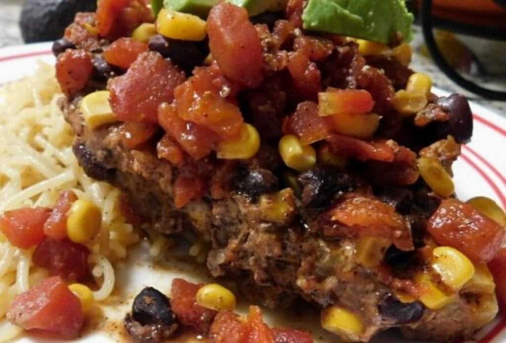 rotel pork chop on a plate with pasta