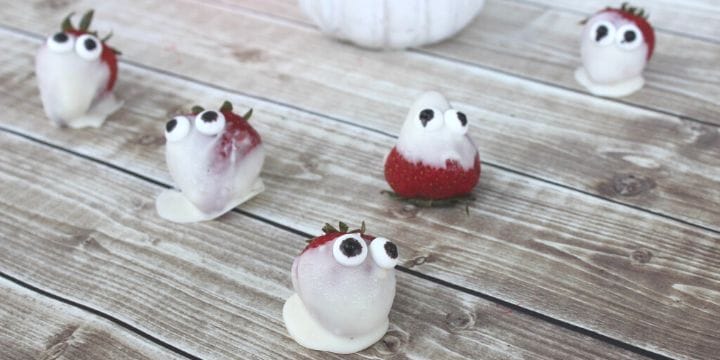 spooky strawberries dipped in white chocolate to make ghosts