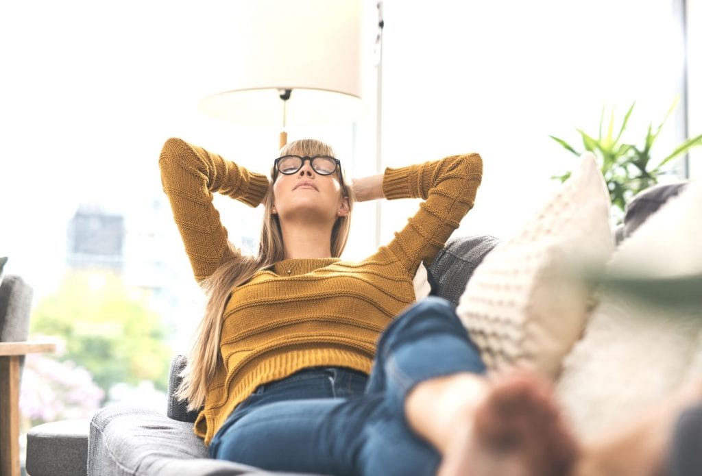 daycare provider relaxing on the couch