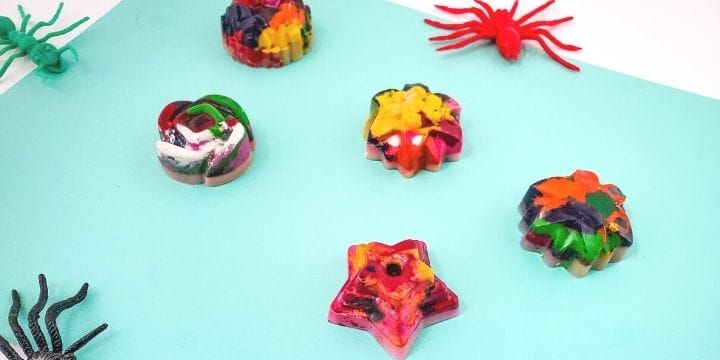 shaped crayons on a sheet of paper