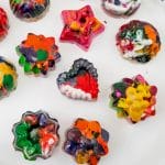 molded shape crayons on a board