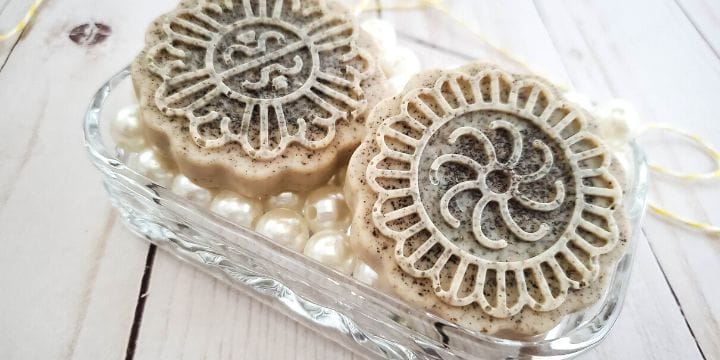 vanilla bean soap on a dish full of pearls