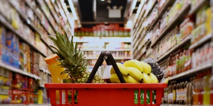 a basket of groceries in the grocery store