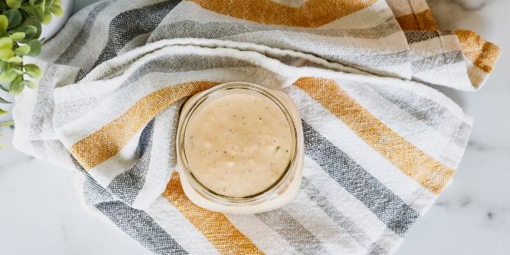 homemade thousand island dressing on a cloth on the counter