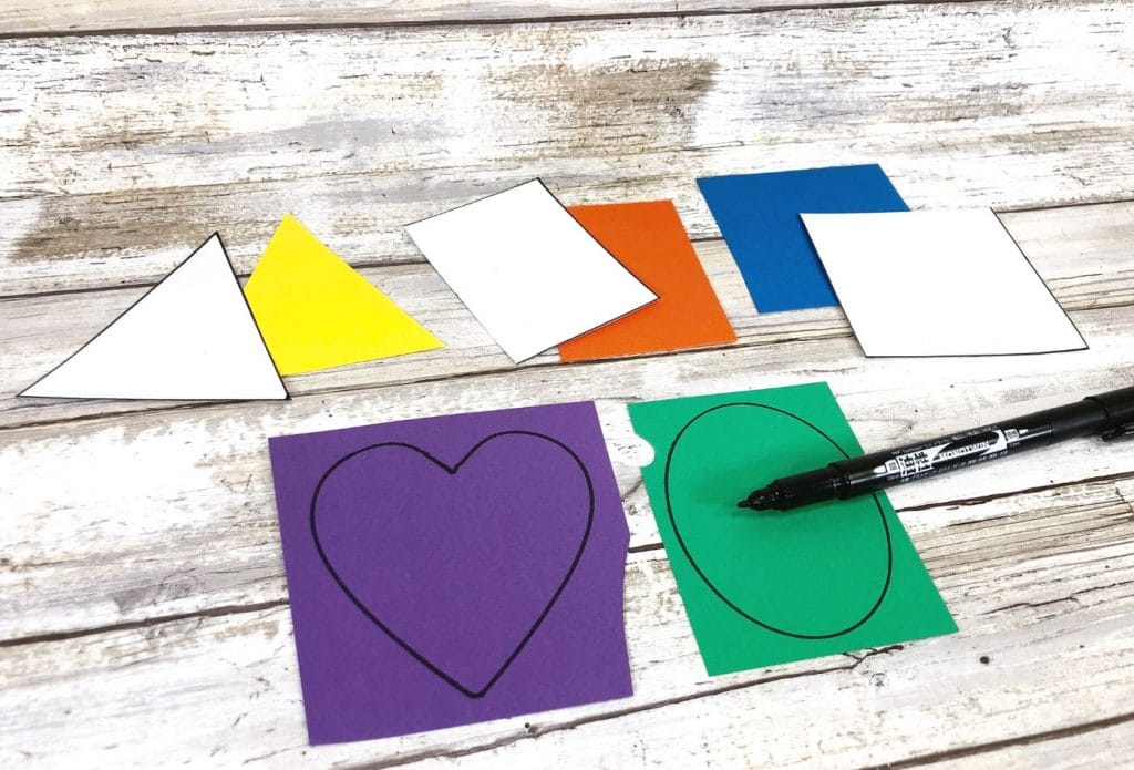 Tracing and cutting out shapes from construction paper