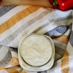 jar of mexican ranch dressing from the top on a towel