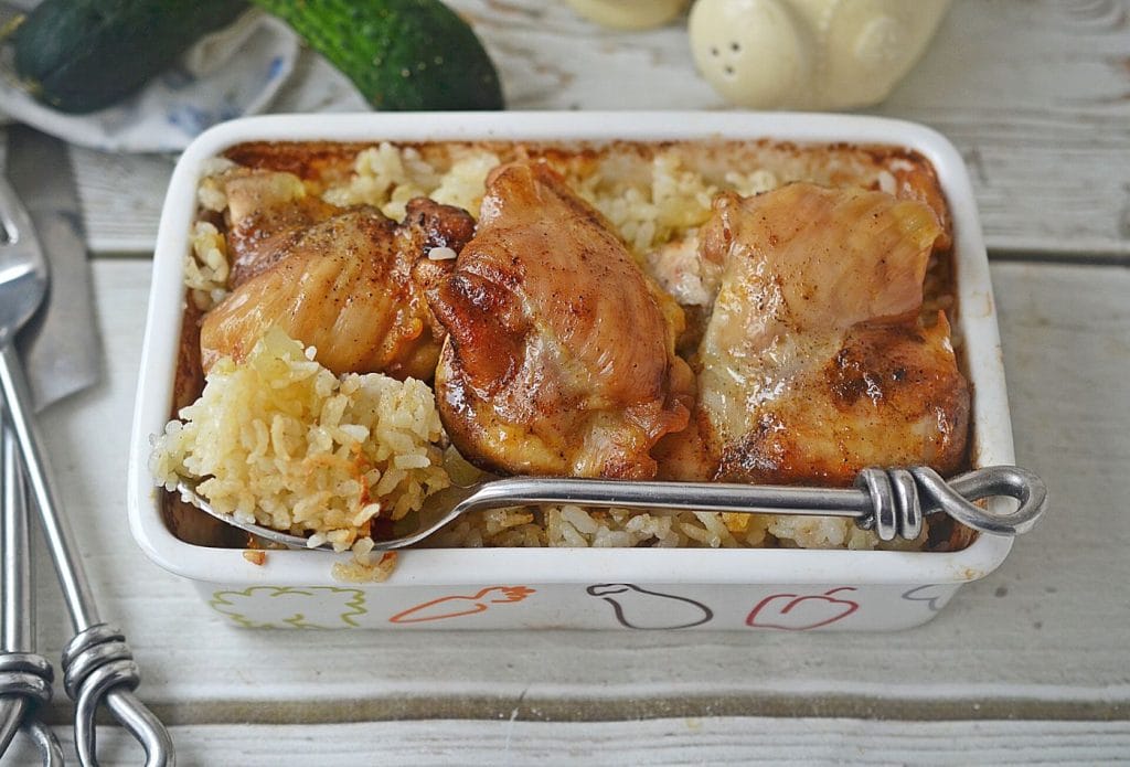 chicken and rice in a dish on the counter