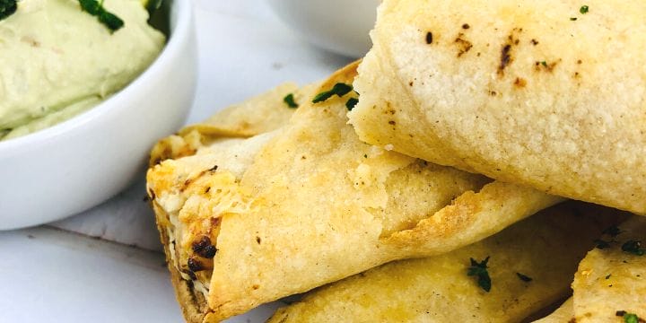 air fryer chicken taquitos on a stack on a plate