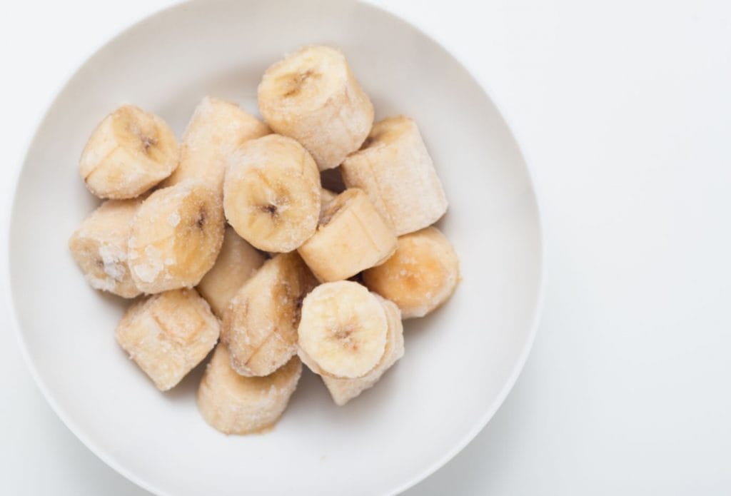 frozen banana slices in a bowl