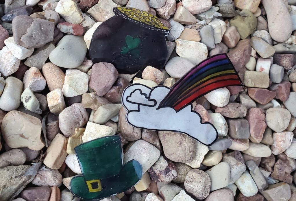 st pats shrinky dinks displayed on rocks