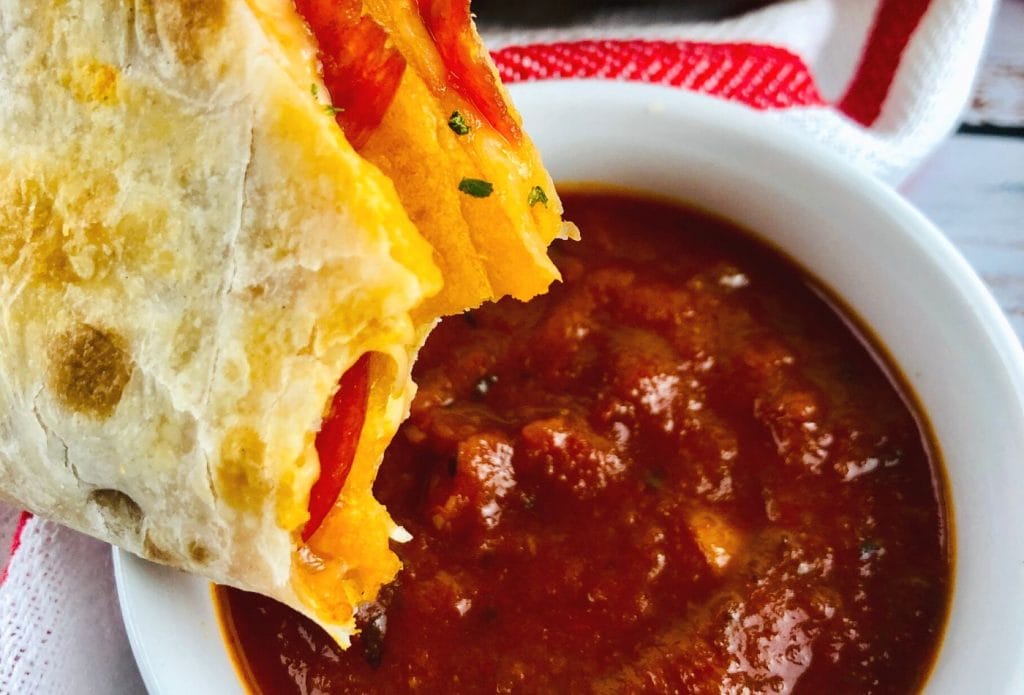 pizza quesadilla from the toaster with marinara sauce