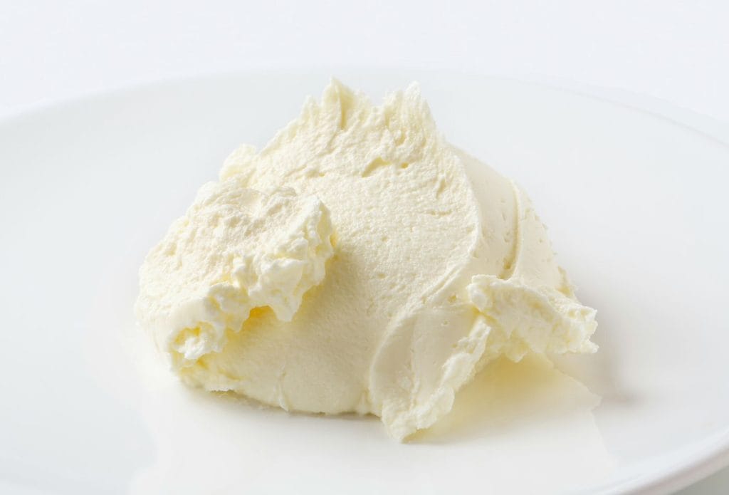 dollop of frozen cream cheese on a plate