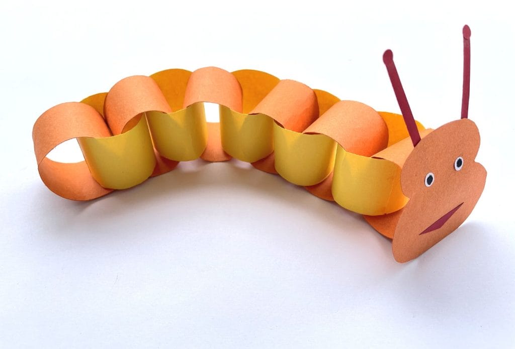 paper chain caterpillar on a table