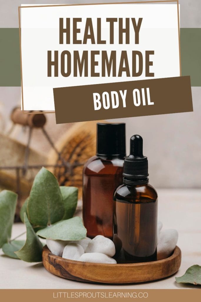 homemade healthy body oil on a tray with other bath products